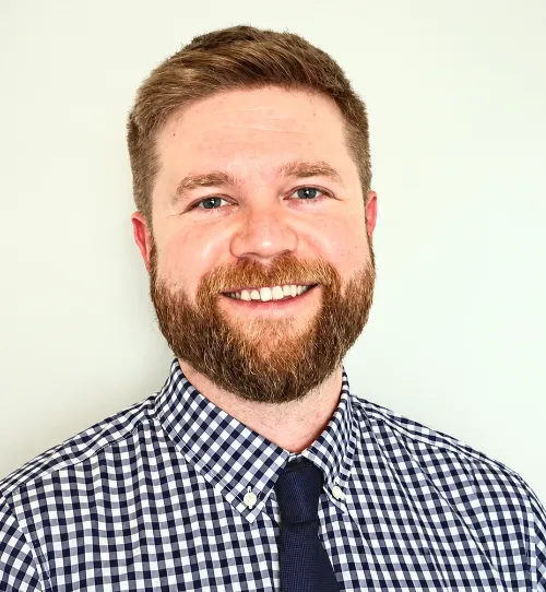 Monforton Smiling Bearded Professional Headshot